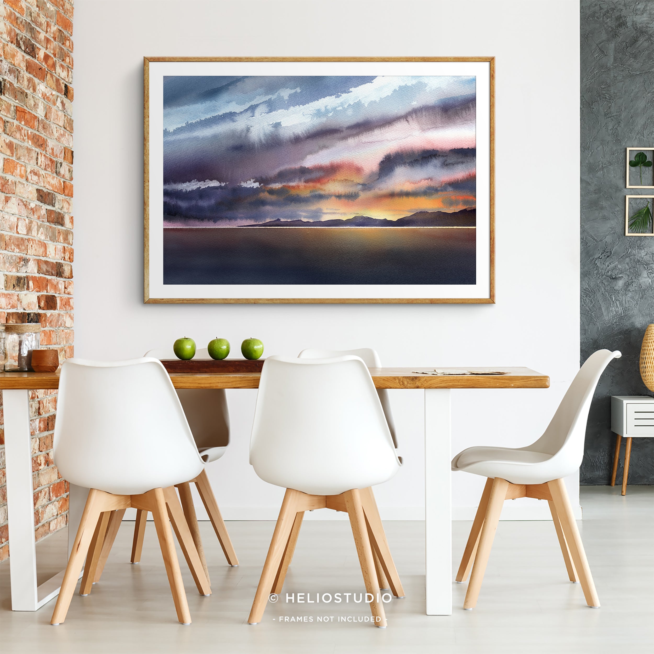 colourful watercolour sunset in wooden frame with white mount hanging in a retro dining room
