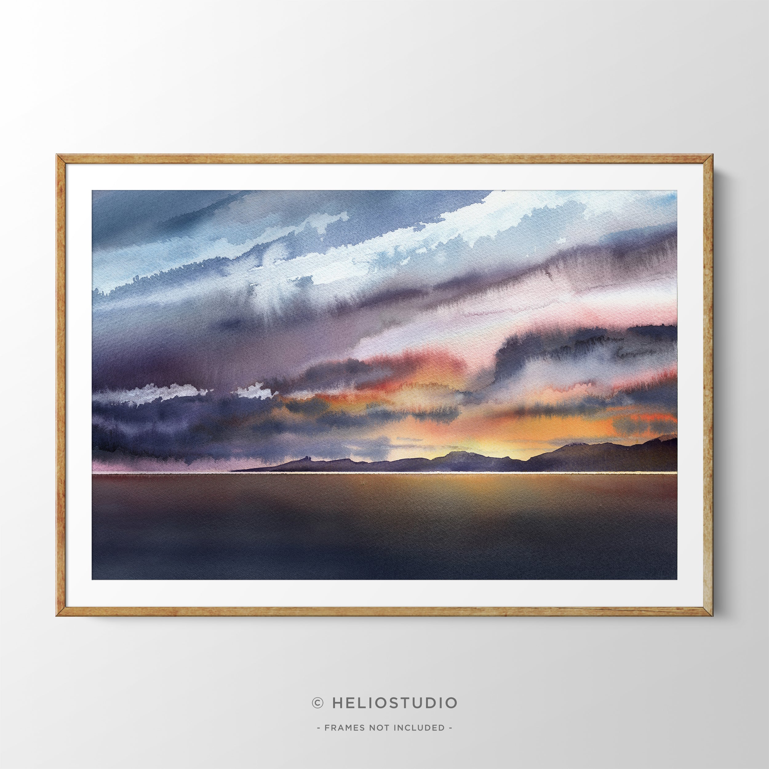 colourful watercolour sunset in wooden frame with white mount